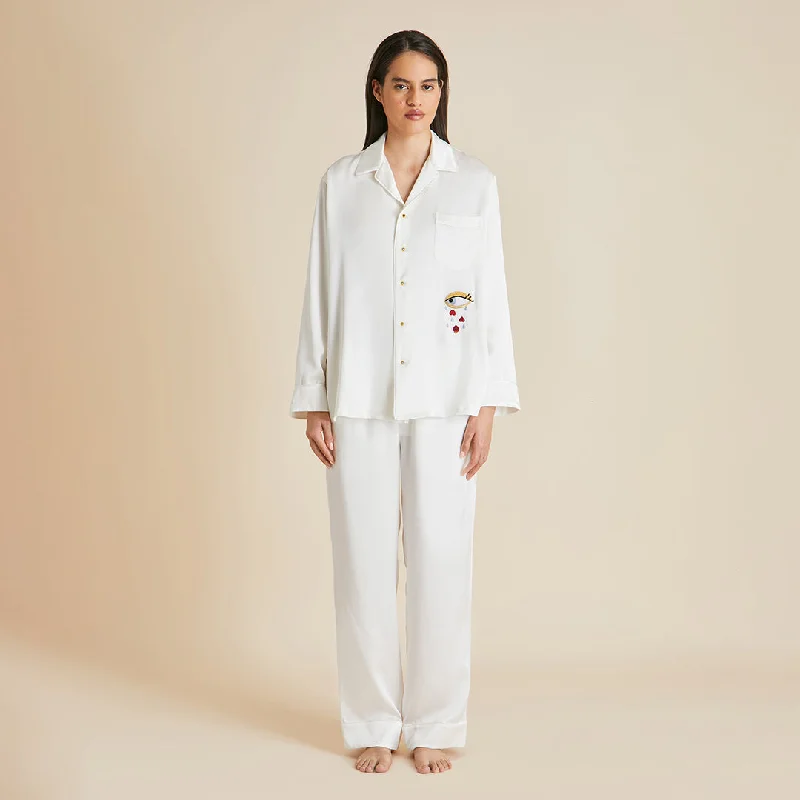 Yves Desire Ivory pajamas in Silk with Ruby and Diamond Buttons by Jessica McCormack